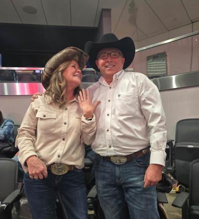 A couple smiles together