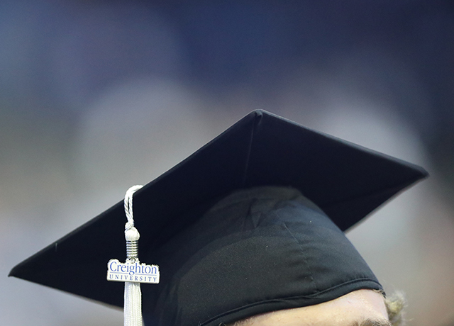 Creighton student wearing graduation cap
