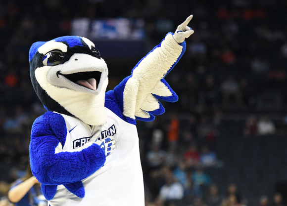 Mascot Billy Bluejay at a basketball game