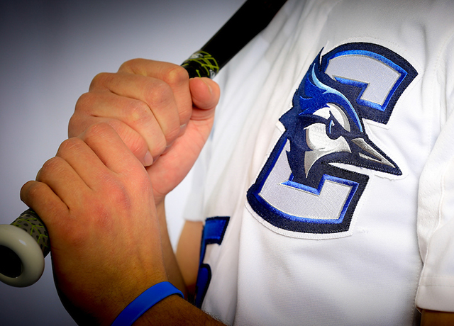 Creighton baseball player holding bat