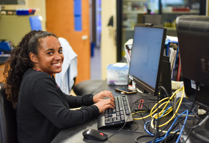 Research intern Kalia Douglas-Micallef in Dr. Peter Steyger's lab at Creighton.