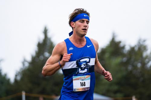 Creighton cross country sophomore Brian Hiltebrand running in a race