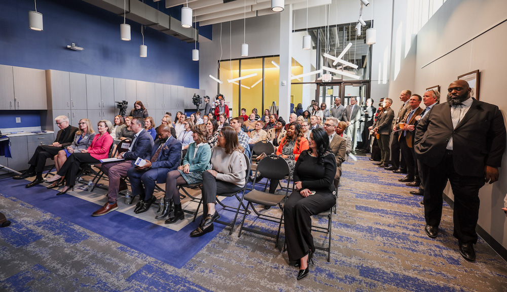 The audience listens at the Child Safety Center opening