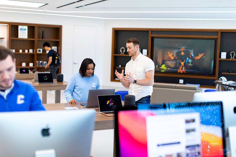 People talk in the iJay Campus Store