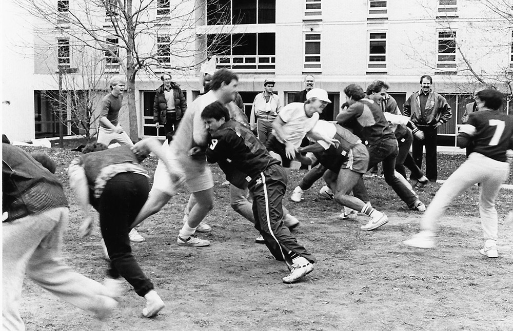 The team plays a game on campus.