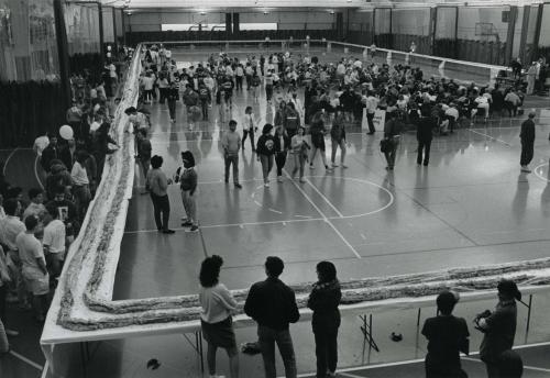 CU Sports Complex sandwich A long sandwich on tables in a gym