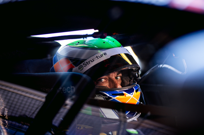 Coleman behind the wheel.