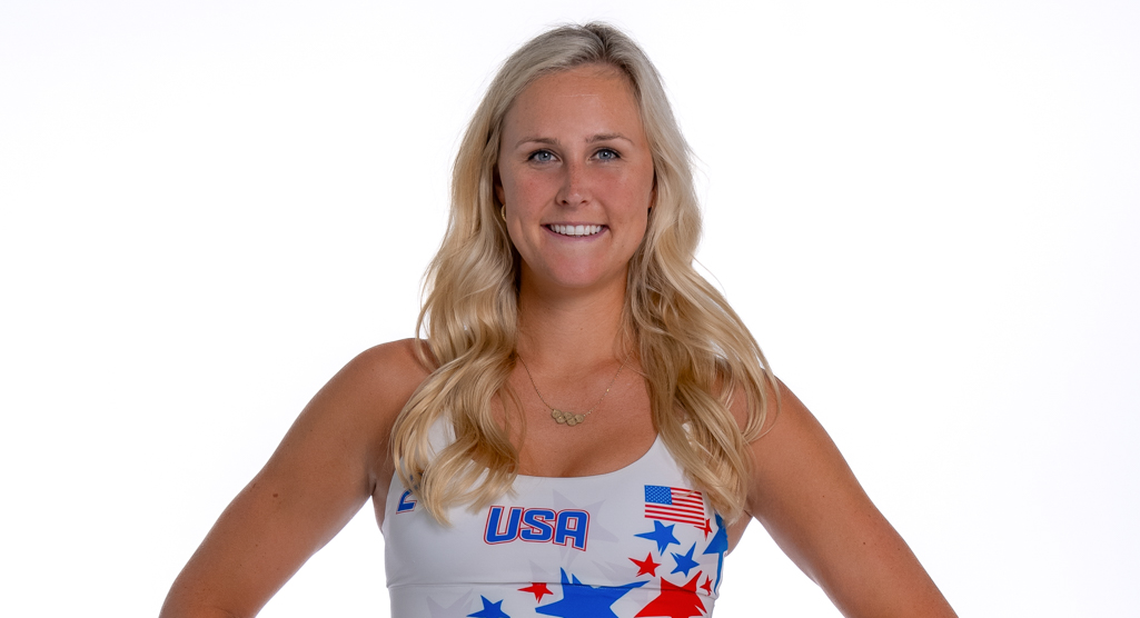 Taryn Kloth, wearing Team USA gear, smiles as she poses for a photo