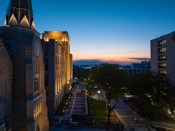 St. Johns and Creighton Hall at night.