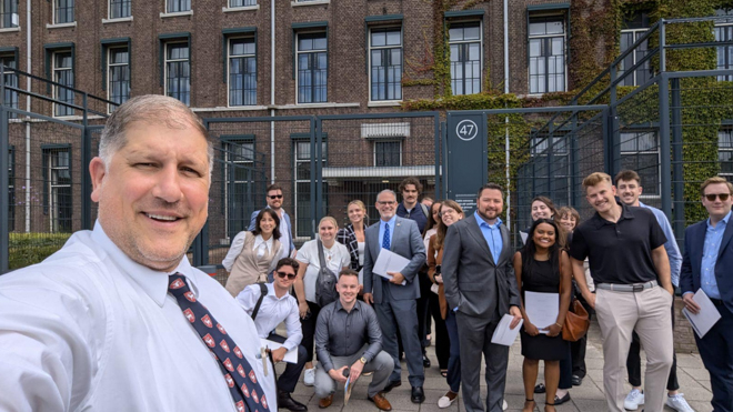 Badell with his fellow Creighton law students traveling for the 2024 Howard A. Kaiman Nuremberg to the Hague program.