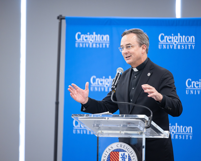 Fr. Hendrickson speaks at the Oct. 30 event.