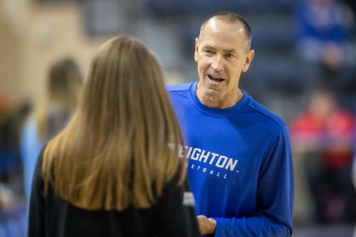 Jim Flanery talks to a member of the coaching staff