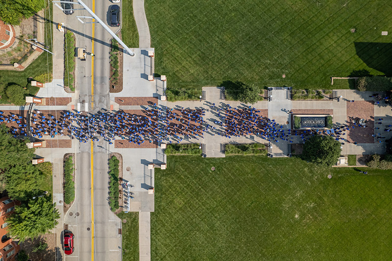 Students walk along the Mall for Creighton Pathway.