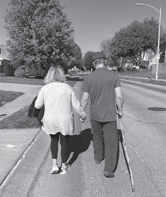 Karyn and Keith Vrbicky take a walk shortly after Keith's heart transplant operation.