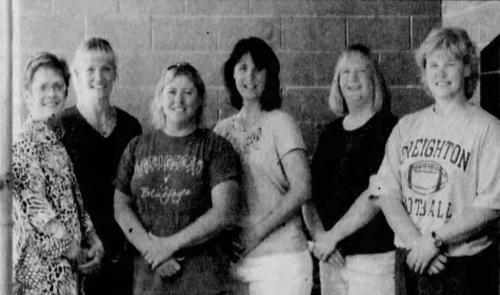 A photo of six smiling women