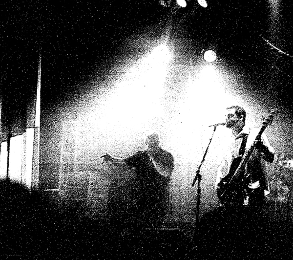 A grainy, hazy glimpse of Smash Mouth performing in 1998.