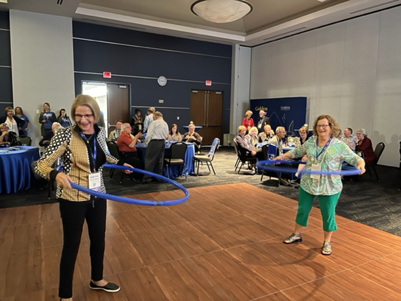 Alums of 72 does a hula hoop contest