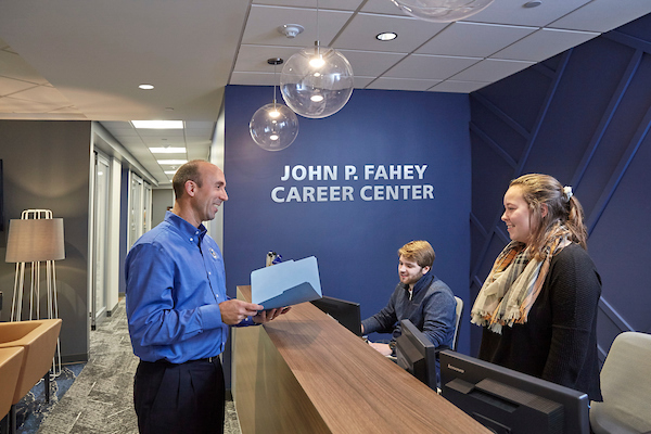 Jeremy Fisher, left, at the John P. Fahey Career Center.