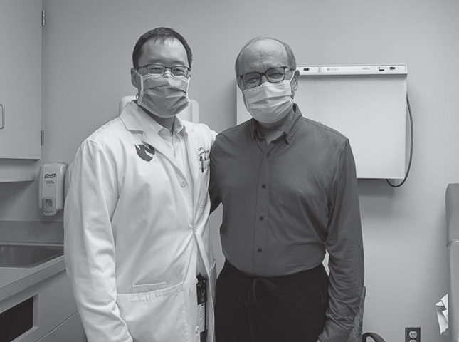 Dr. Vrbicky, right, with physician Dr. John Um after Vrbicky's transplant.