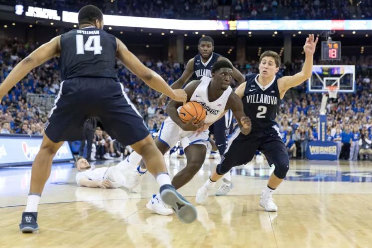 A player dribbles through the defense