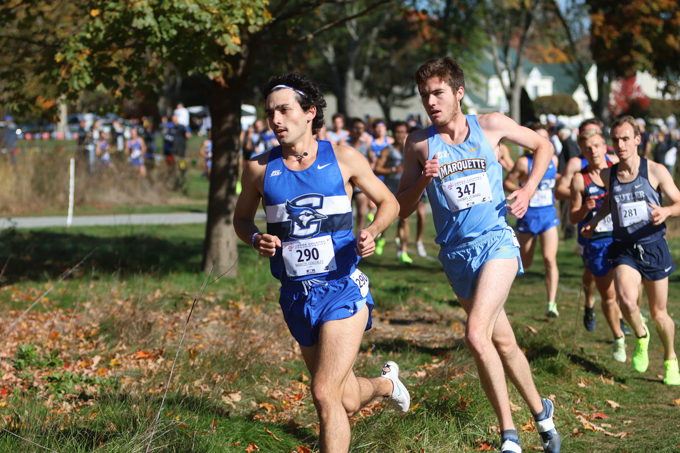 Marcos Gonzalez leads the pack at a cross country meet.