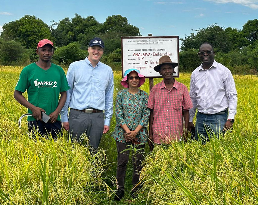 Zach Stewart with farmers in Madagascar