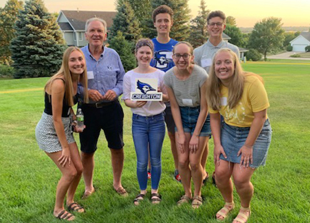 Dan McGuire, second from left, with his fellow Creighton students at the Des Moines send-off event. 