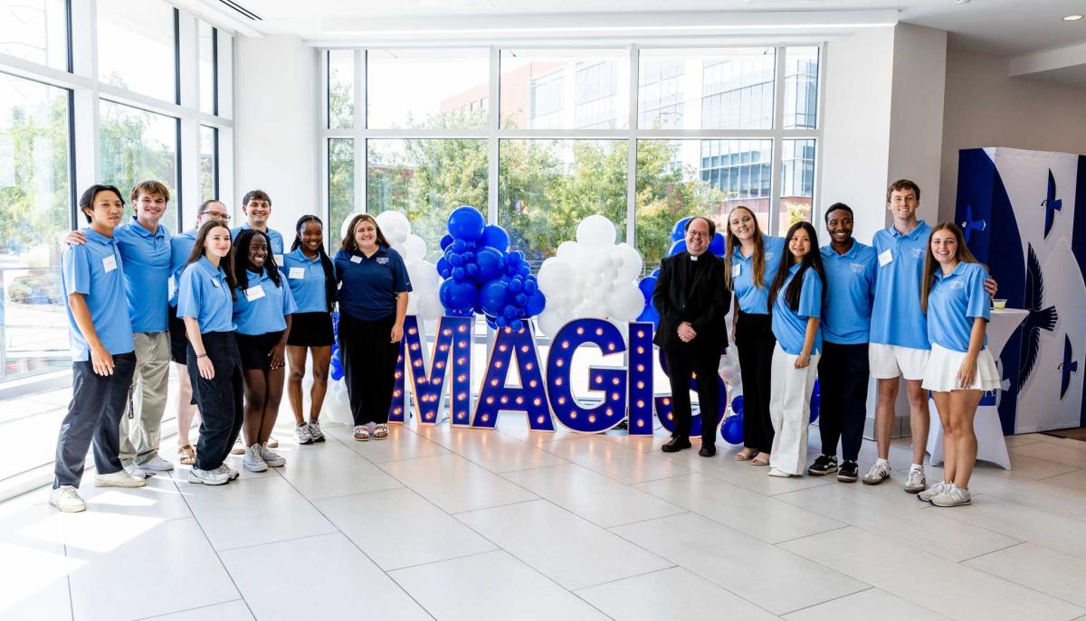 Students gather in a residence hall lobby