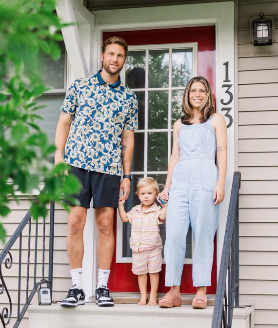 Emily Belden Bond with her husband, Matt Bond, and their son.