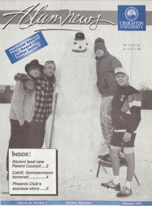 Creighton Advent Calendar Day 18 1993 snowman One student stands on a chair and three others gather around a large snowman