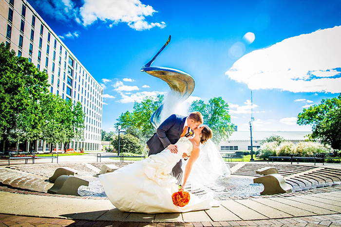 Carrie and Spencer Werth in front of the fountains.