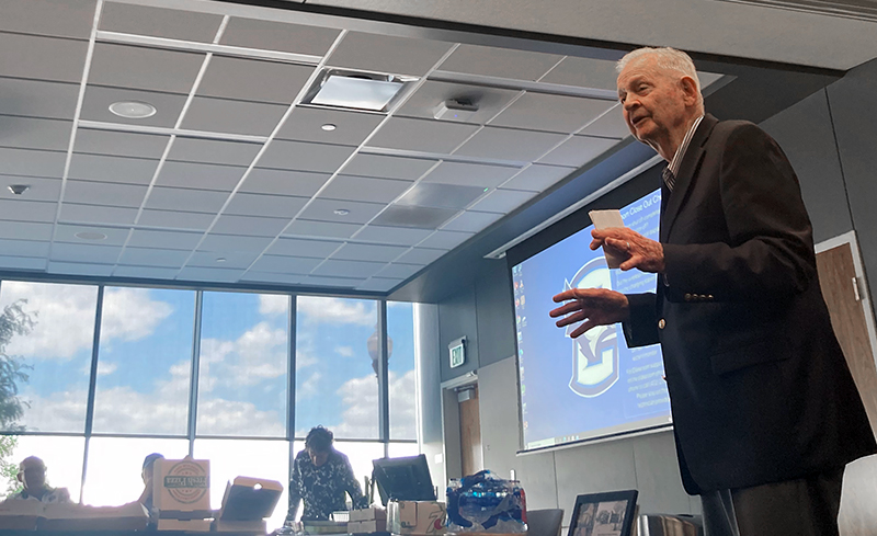 Bill Carlisle speaks at his retirement party.