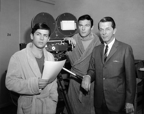 William Dozier, right, with Burt Ward, left, and Adam West.