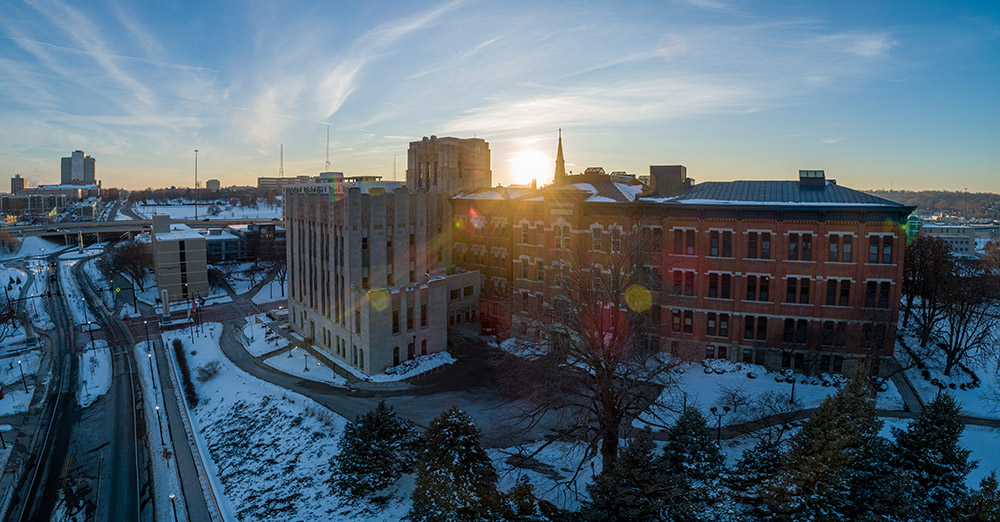 Sun sets over campus facing west.