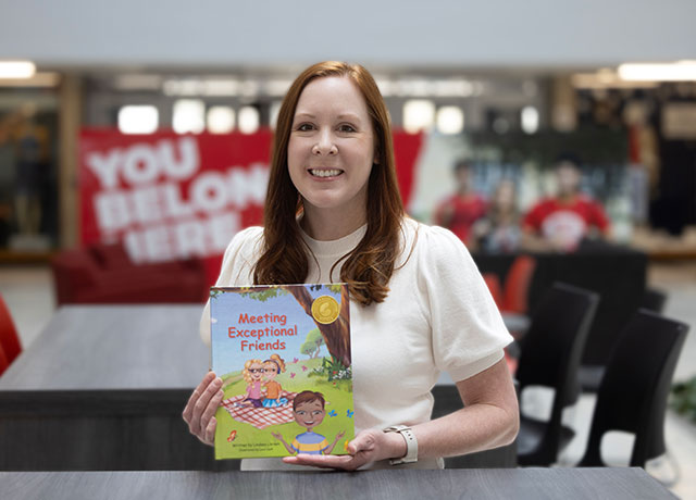 Lindsey Larsen with book
