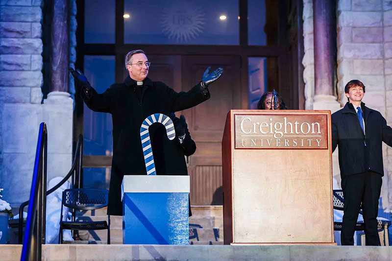 Fr. Hendrickson presenting at the holiday lighting event