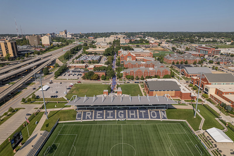 Students walk along the Mall for Creighton Pathway.