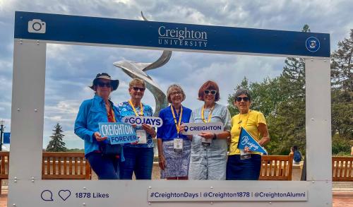 Creighton Days 2025 deglman crew Alumni pose together for a photo