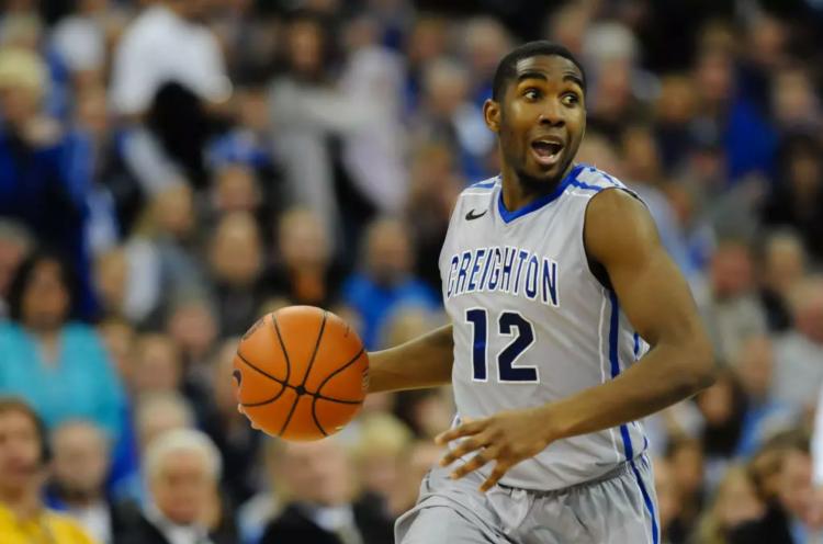 A player dribbles down the court