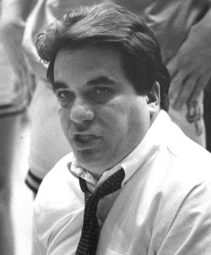 A coach in the huddle