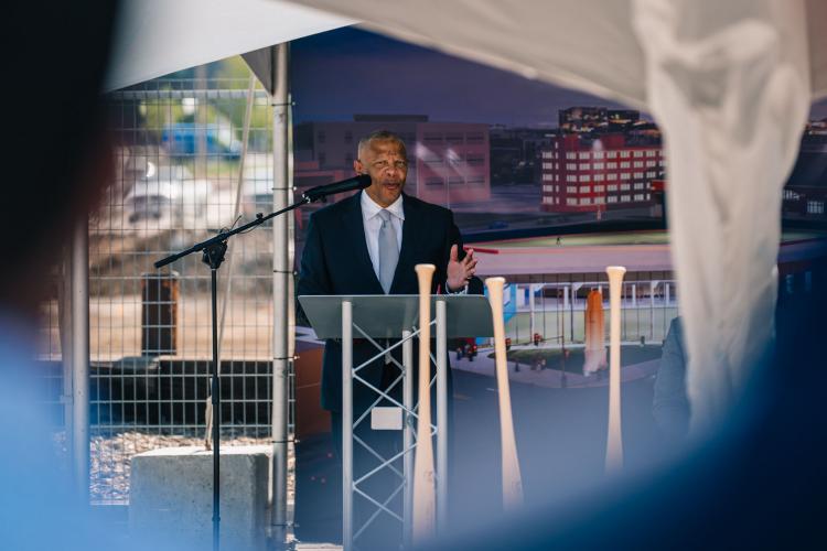 Baseball Softball Groundbreaking Ewing Omaha's mayor speaks behind a lectern