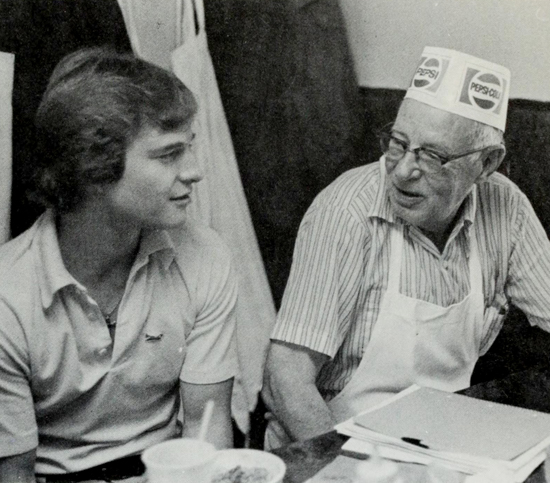 Howard, right, with student Tom Adams.
