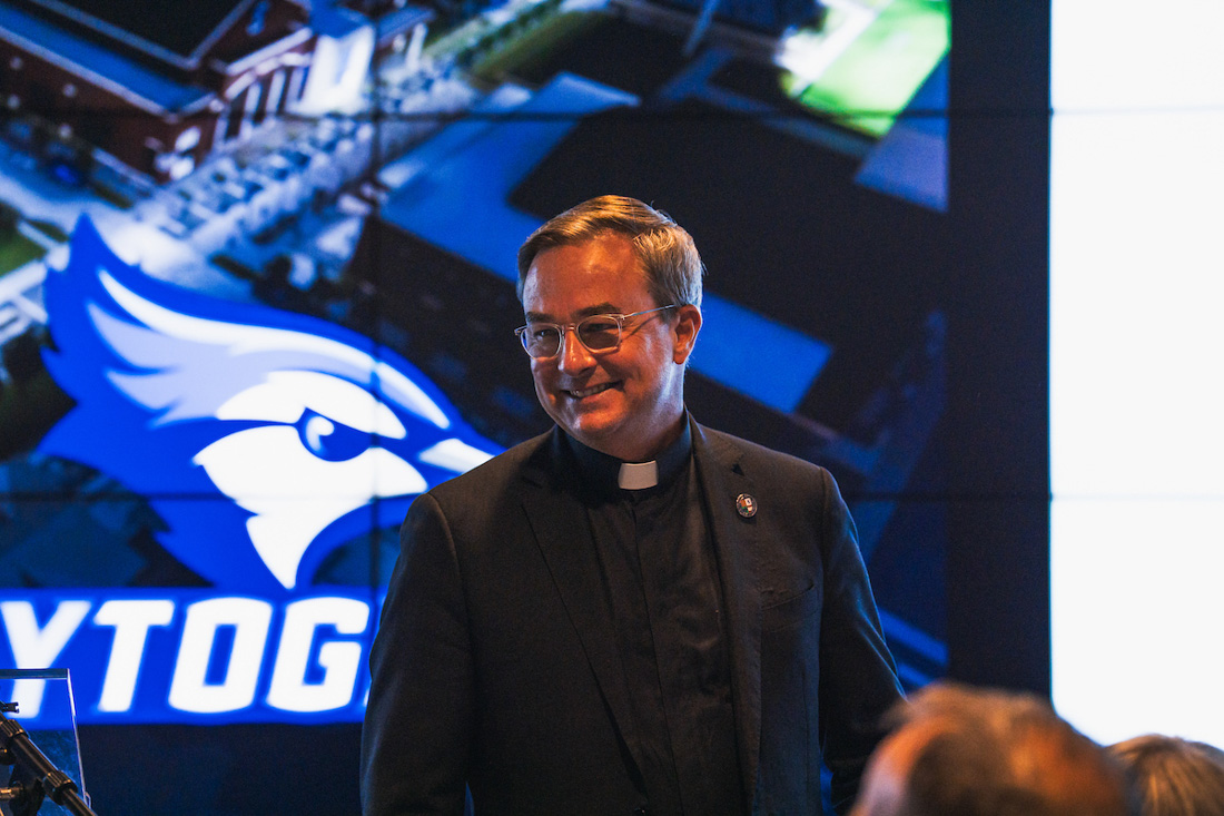 Father Hendrickson at the Fly Together event