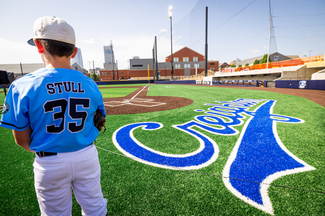 One of the catchers overlooks the field.