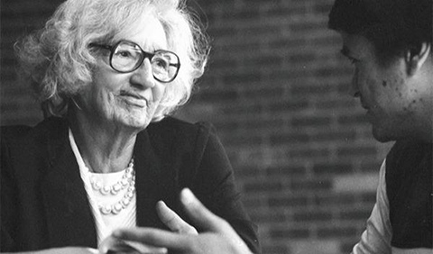 Frances Ryan speaks with a student.