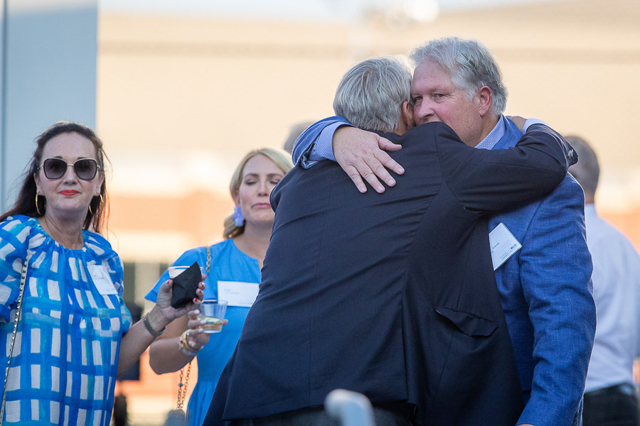 Jim Simpson and Lee Graves hug