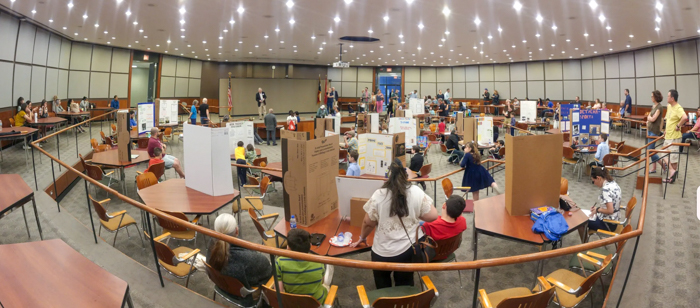 Students present their projects at the Young Inventors Showcase. 