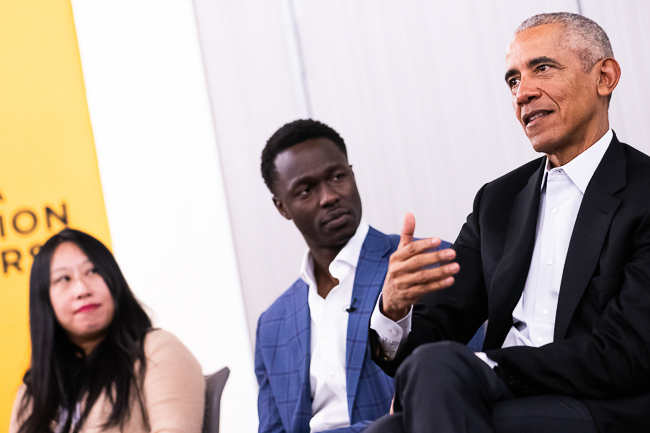 Jacob Idra, listens to former President Barack Obama speak.