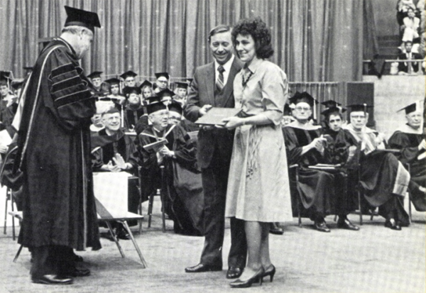 Edward and Alice Ramaekers accepting Jerry Pfeifer&rsquo;s degree at Creighton commencement in 1986.