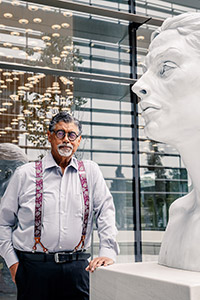 Littleton Alston standing with sculpture